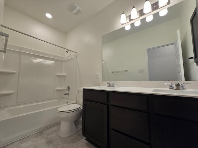 bathroom with washtub / shower combination, double vanity, visible vents, toilet, and a sink
