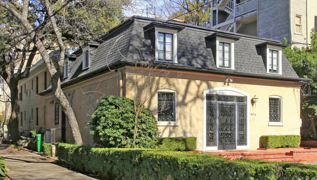 504 W 7th St, Austin, TX 78701 - exterior space with roof with shingles and mansard roof