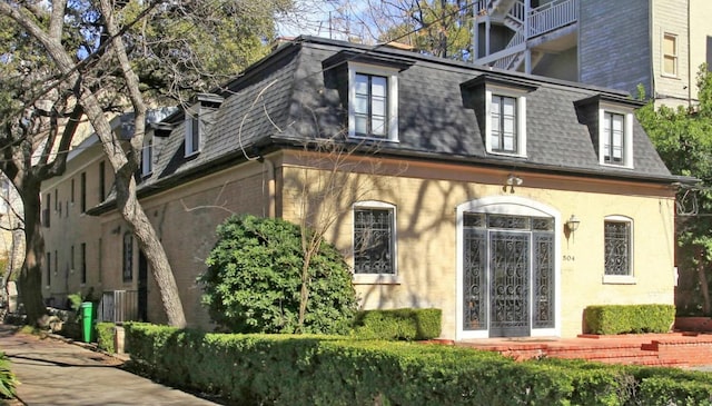 504 W 7th St, Austin, TX 78701 - exterior space with roof with shingles and mansard roof