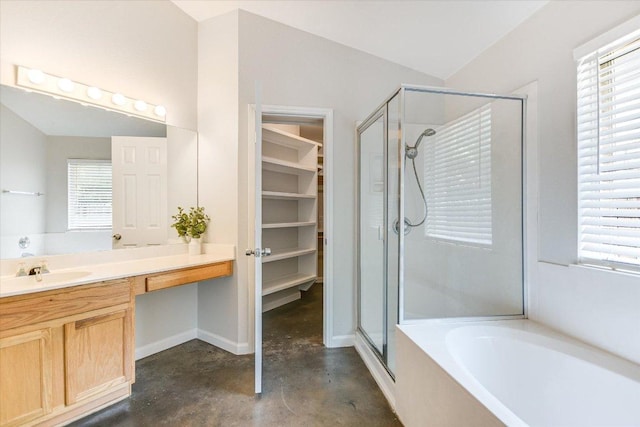 11518 James B Connolly Ln, Austin, TX 78748 - full bath with a shower stall, concrete floors, a bath, vanity, and healthy amount of natural light