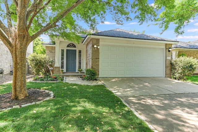 view of front of house featuring an attached garage, stone siding, a front lawn, and driveway