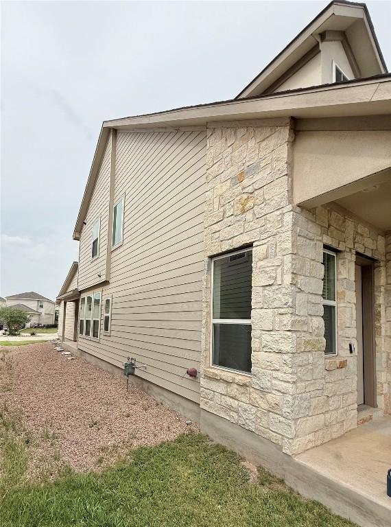 793 Lone Peak Way, Dripping Springs, TX 78620 - view of property exterior with stone siding