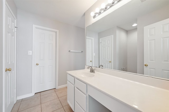 8139 Evadean Cir, Austin, TX 78745 - bathroom featuring vanity, baseboards, and tile patterned flooring