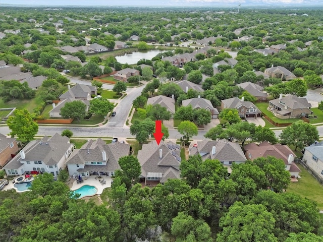 3820 Lagoona Dr, Round Rock, TX 78681 - aerial view of residential area with a pool area and a nearby body of water