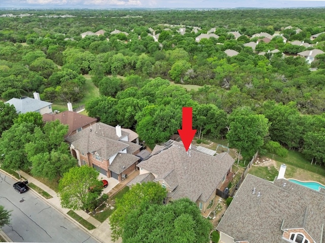 3820 Lagoona Dr, Round Rock, TX 78681 - aerial overview of property's location with a heavily wooded area and nearby suburban area