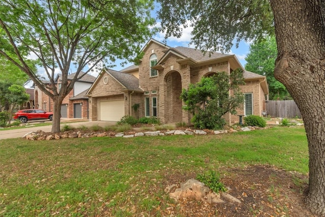 3820 Lagoona Dr, Round Rock, TX 78681 - traditional-style house featuring brick siding, an attached garage, concrete driveway, and roof with shingles