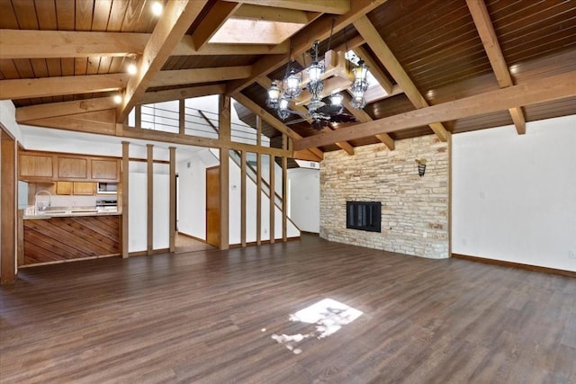502 Grace Ln, Austin, TX 78746 - unfurnished living room featuring a chandelier, dark wood finished floors, wood ceiling, baseboards, and stairway