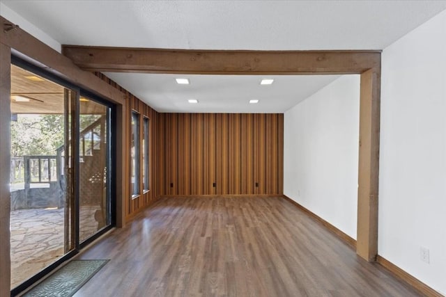 502 Grace Ln, Austin, TX 78746 - spare room with wood finished floors and baseboards