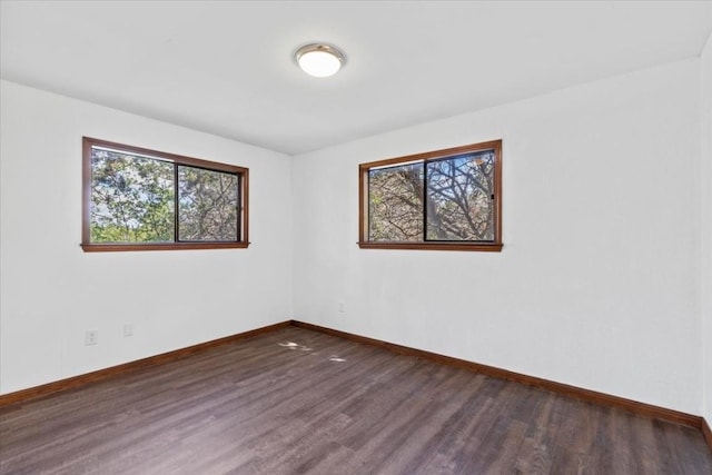 502 Grace Ln, Austin, TX 78746 - spare room with wood finished floors and baseboards