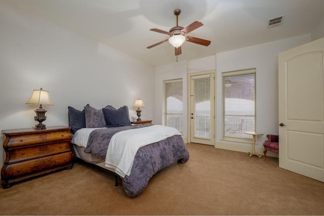 8315 Lime Creek Rd, Volente, TX 78641 - bedroom featuring access to outside, carpet floors, and a ceiling fan