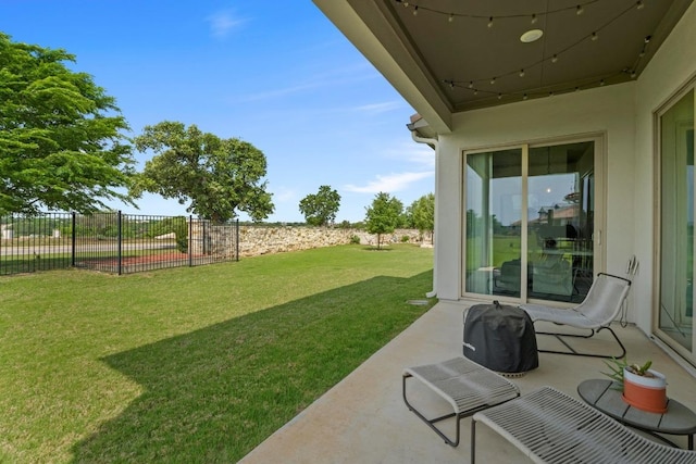 view of yard with a patio and fence