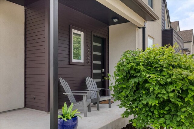 4323 Attra St, Austin, TX 78723 - doorway to property with stucco siding