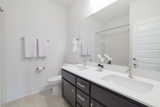 4323 Attra St, Austin, TX 78723 - bathroom featuring toilet, tiled shower, and a sink
