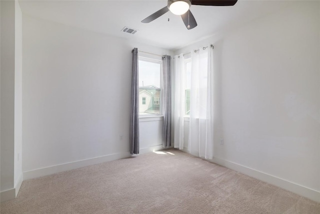 4323 Attra St, Austin, TX 78723 - empty room featuring ceiling fan, visible vents, baseboards, and light carpet