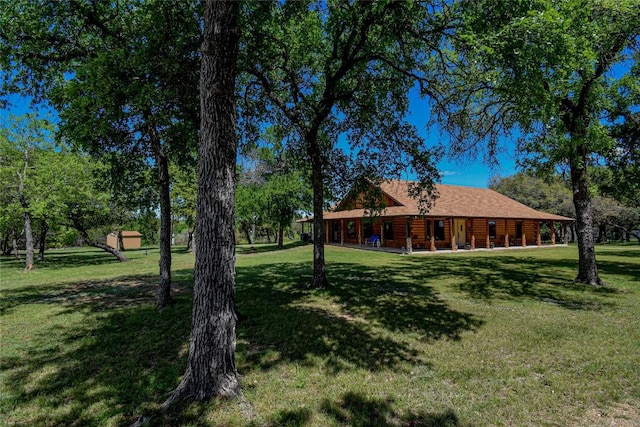 view of yard featuring a porch