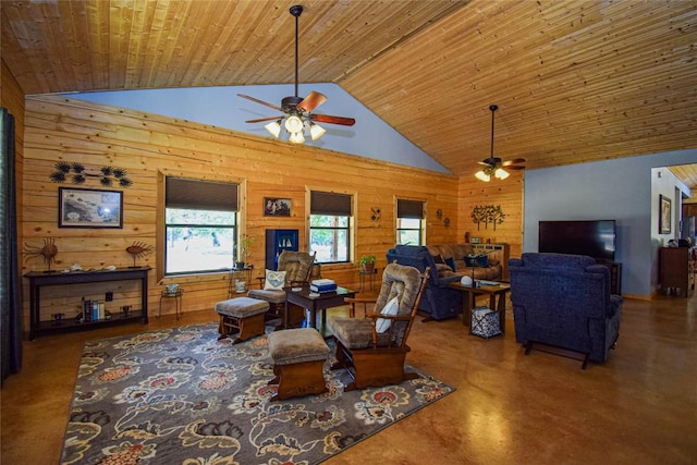living area with wood walls, wooden ceiling, concrete floors, high vaulted ceiling, and ceiling fan