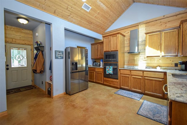 kitchen with wooden walls, wall chimney exhaust hood, stainless steel appliances, and visible vents