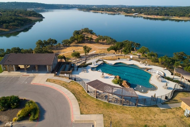 7413 Desert Needle Dr, Lago Vista, TX 78645 - drone / aerial view of a pool area and a nearby body of water