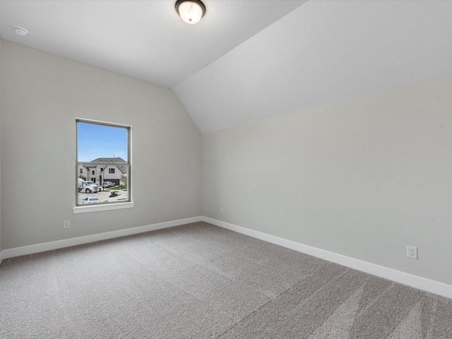 7413 Desert Needle Dr, Lago Vista, TX 78645 - additional living space featuring vaulted ceiling, carpet flooring, and baseboards