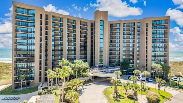 view of building exterior with a water view