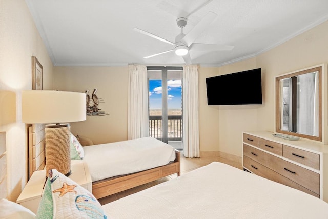 bedroom featuring ceiling fan, baseboards, ornamental molding, and access to exterior