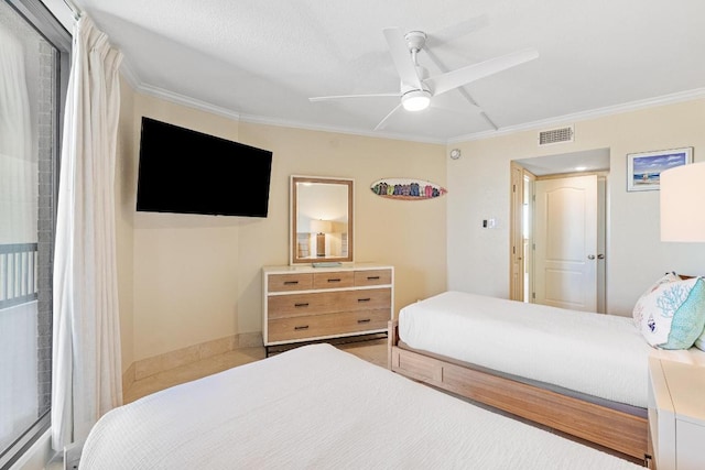 bedroom featuring baseboards, visible vents, ceiling fan, and crown molding