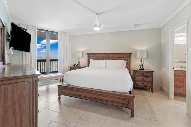 bedroom with crown molding, ensuite bathroom, light tile patterned floors, ceiling fan, and access to exterior