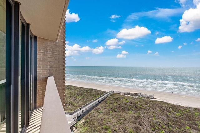view of water feature with a beach view