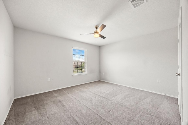 7001 Midlothian Dr, Austin, TX 78754 - carpeted spare room featuring a ceiling fan and baseboards