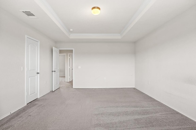 7001 Midlothian Dr, Austin, TX 78754 - carpeted spare room featuring ornamental molding, a raised ceiling, and baseboards