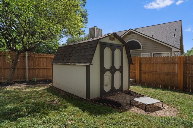 2003 Ploverville Ln, Austin, TX 78728 - view of shed featuring a fenced backyard and cooling unit