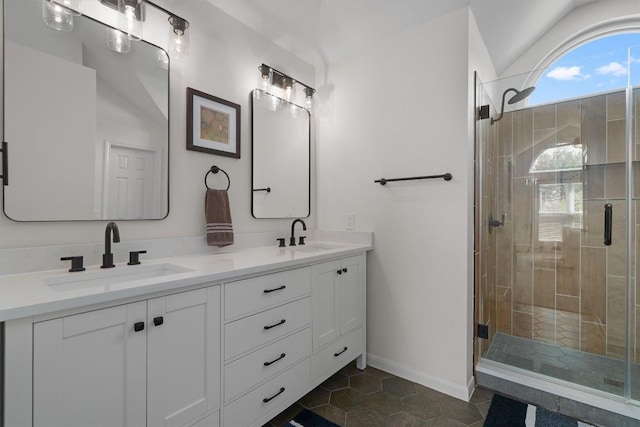 2003 Ploverville Ln, Austin, TX 78728 - full bathroom with tile patterned floors, a sink, and a stall shower