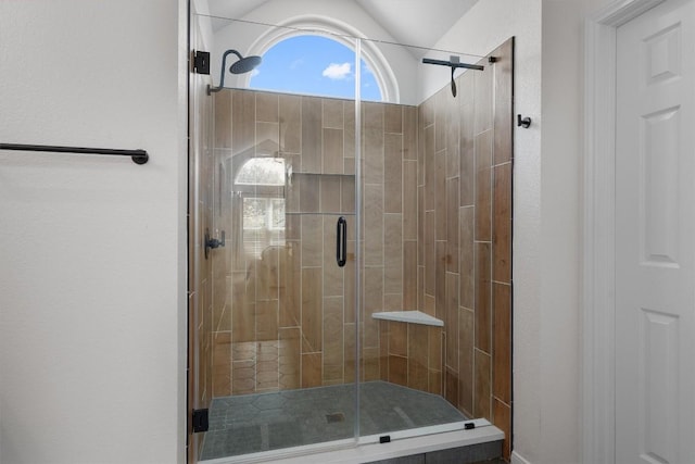 2003 Ploverville Ln, Austin, TX 78728 - bathroom featuring a shower stall and vaulted ceiling
