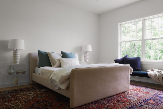 bedroom with multiple windows