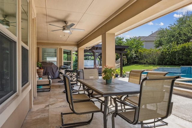 2505 Livenza Pl, Leander, TX 78641 - fenced backyard with ceiling fan, a patio area, and outdoor dining space