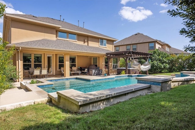 2505 Livenza Pl, Leander, TX 78641 - back of property with a hot tub, a pergola, stucco siding, and an outdoor pool