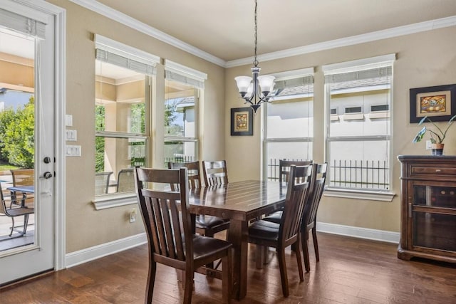 2505 Livenza Pl, Leander, TX 78641 - dining area featuring a chandelier, dark wood-type flooring, and crown molding