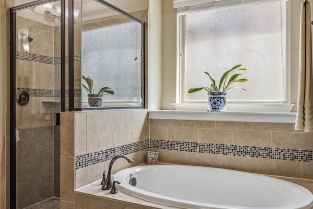 2505 Livenza Pl, Leander, TX 78641 - full bathroom with a garden tub, plenty of natural light, and a stall shower
