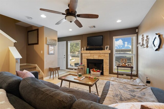 living room with baseboards, visible vents, recessed lighting, a ceiling fan, and stairway