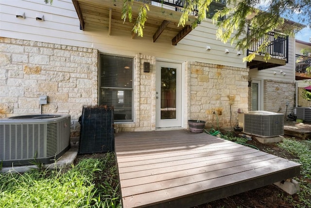 wooden deck featuring central AC