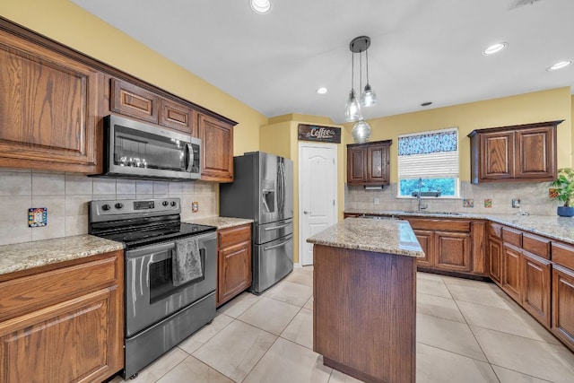 2701 Handler Holw, San Marcos, TX 78666 - kitchen featuring stainless steel appliances, decorative backsplash, a sink, a kitchen island, and recessed lighting
