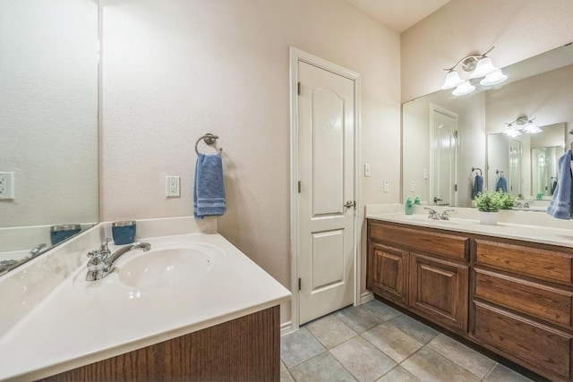 2701 Handler Holw, San Marcos, TX 78666 - full bathroom featuring vanity and tile patterned floors