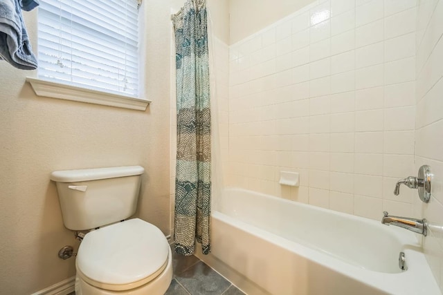 full bathroom with shower / bath combination with curtain and toilet