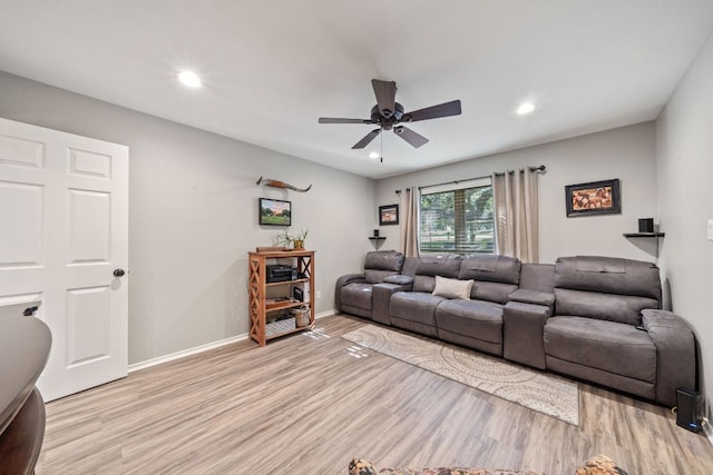 living area with recessed lighting, light wood-type flooring, baseboards, and ceiling fan