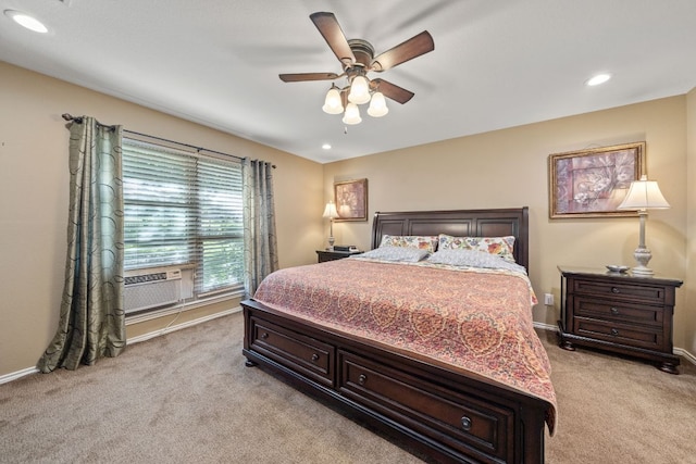 25 Doolittle Dr, Wimberley, TX 78676 - bedroom with light carpet, baseboards, cooling unit, recessed lighting, and a ceiling fan
