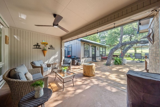 view of patio / terrace featuring ceiling fan