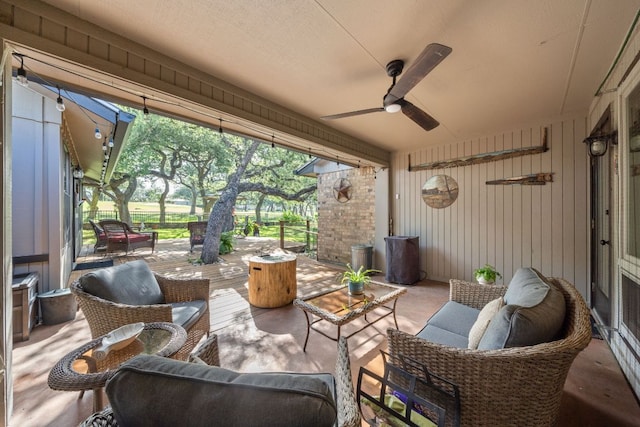 view of patio featuring a ceiling fan and an outdoor hangout area