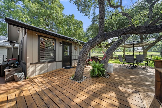 25 Doolittle Dr, Wimberley, TX 78676 - wooden terrace featuring outdoor dining area