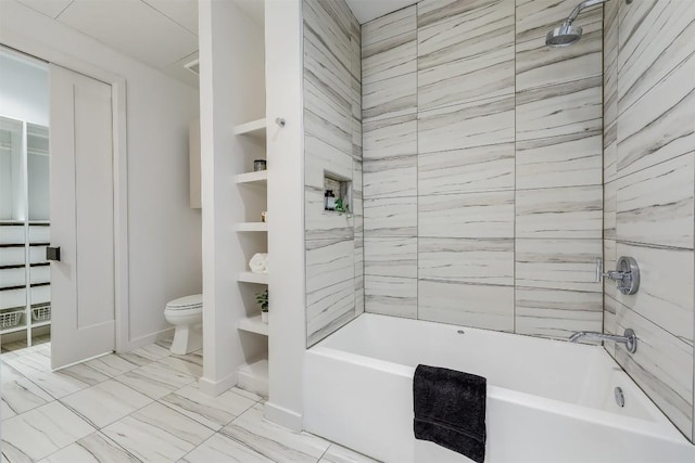 1501 E 4th St Unit 206, Austin, TX 78702 - bathroom with bathtub / shower combination and marble finish floors