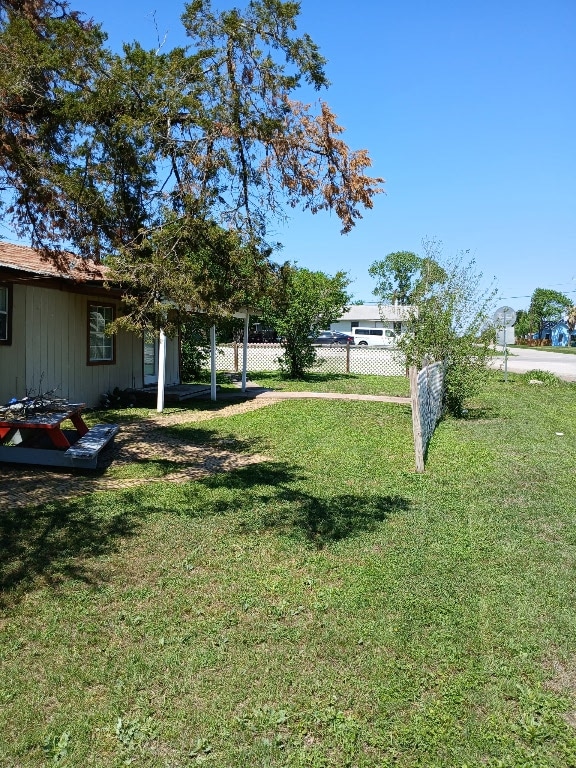 view of yard featuring fence